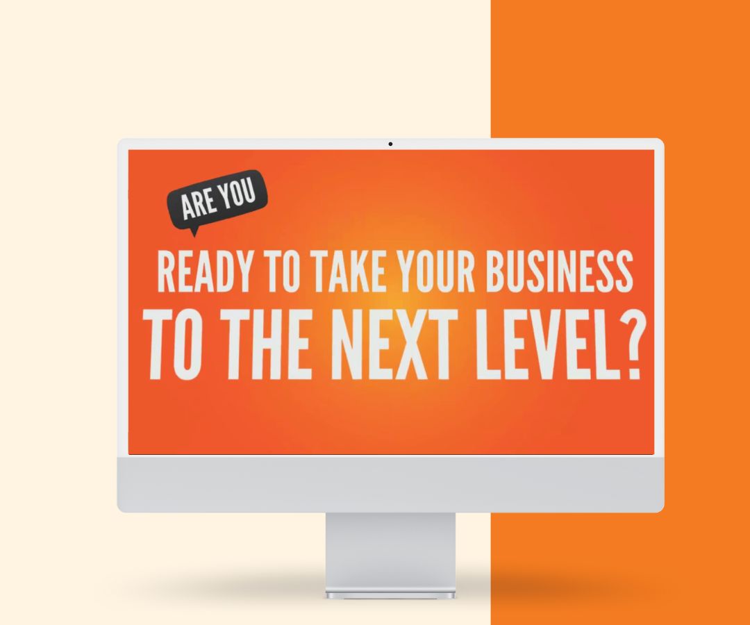 This portfolio image depicts a bold promotional slide displayed on a desktop monitor, featuring a strong call-to-action message about taking a business to the next level.