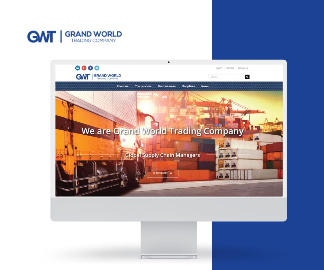 A clean, modern portfolio mockup featuring the Grand World Trading Company website displayed on a desktop screen, highlighting global logistics and supply chain services with a bold, professional design.